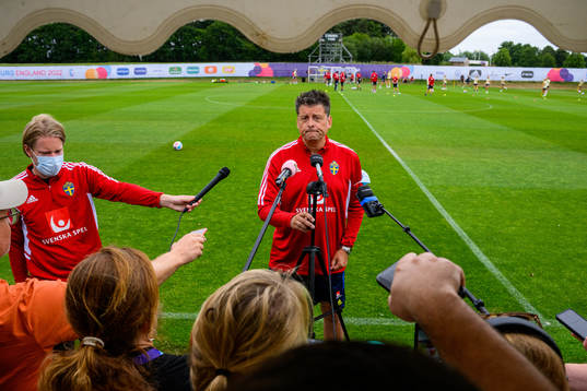 Mats Börjesson, doctor of the Swedish women's national football team is interviewed by the media at a training session
