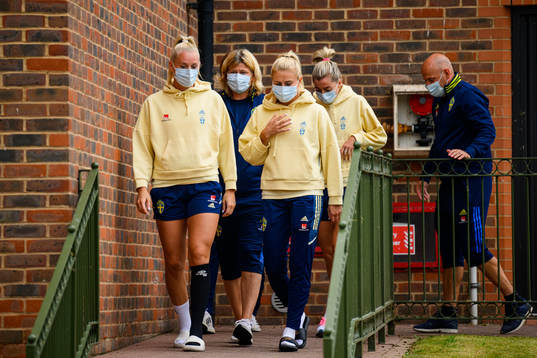 Stina Blackstenius, Amanda Nilden, Rebecca Schelin, press officer and Linda Sembrant of the Swedish women's national football team walks to a press conference