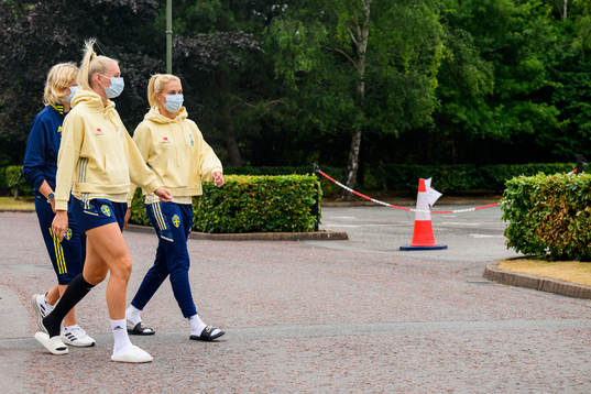 Stina Blackstenius, Amanda Nilden, Rebecca Schelin, press officer of the Swedish women's national football team walks to a press conference