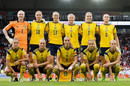 The starting eleven of Sweden pose for a team photo the