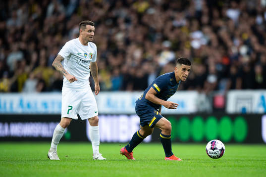 Denys Oliynyk of Vorskla Poltava and Nicolas Stefanelli of