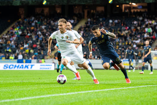 Artem Cheliadin of Vorskla Poltava and Nicolas Stefanelli