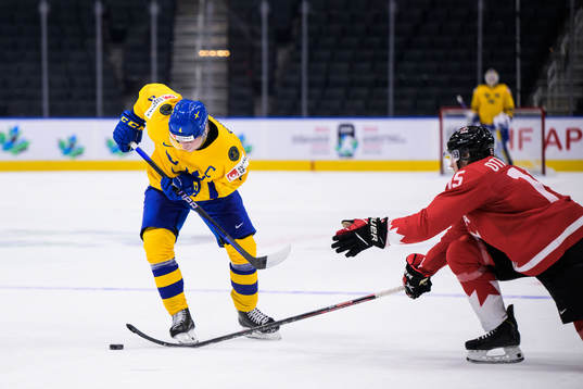 Emil Andrae of Sweden and Brennan Othmann of Canada