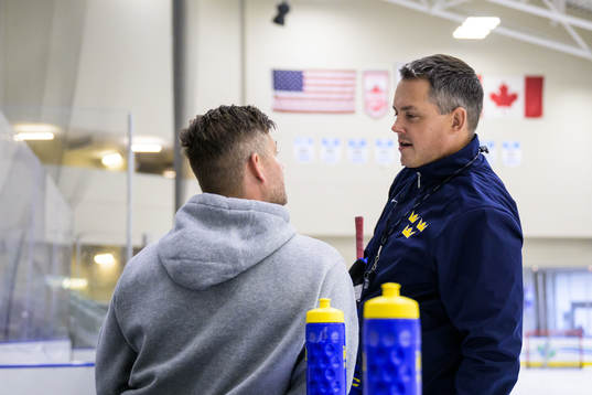Doctor Ryan Allenby and head coach Tomas Montén of Sweden