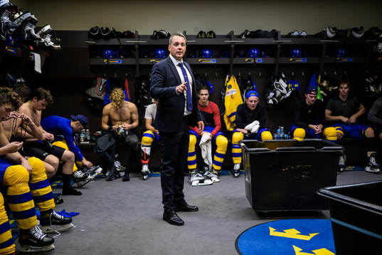 Head coach Tomas Montén of Sweden talks to the players