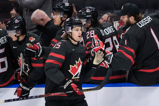 Brennan Othmann of Canada celebrates the 1-0 goal