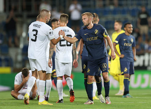 Michal Kadlec of Slovacko and Sebastian Larsson of AIK