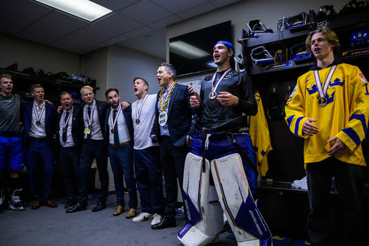 Anton Olsson, assistant coach Patrik Andersson, goaltender
