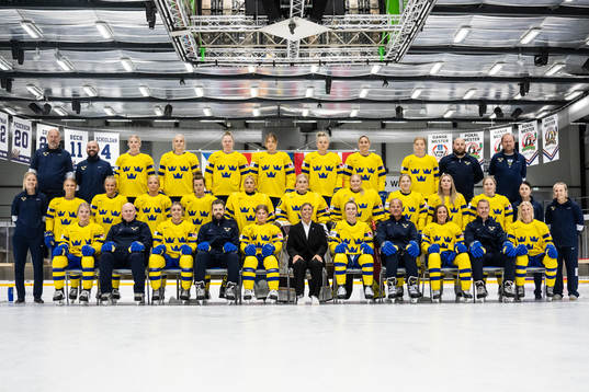 Players and team staff of Sweden pose for a team photo