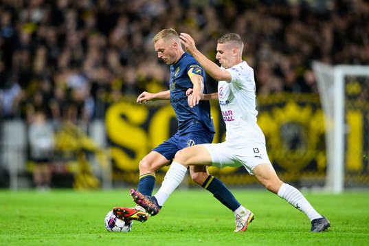 Sebastian Larsson of AIK and Michal Kohút of Slovacko