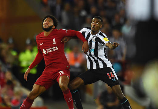 Joe Gomez of Liverpool and Alexander Isak of Newcastle