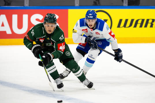 Max Lindroth of Färjestad and Elias Wallenta of Villach