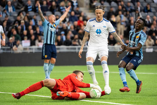 Goalkeeper Jacob Karlstrøm and Birk Risa of Molde and