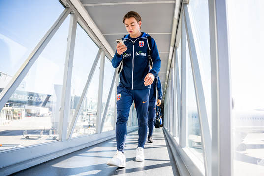 Patrick Berg of the Norwegian national football team arrives at Brnik airport