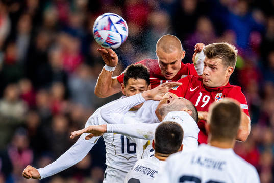 Sasa Lukic of Serbia against Leo Skiri Østigård and