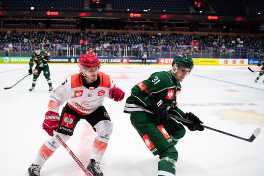 Saku Kinnunen of Comarch Cracovia and Carl Jakobsson of