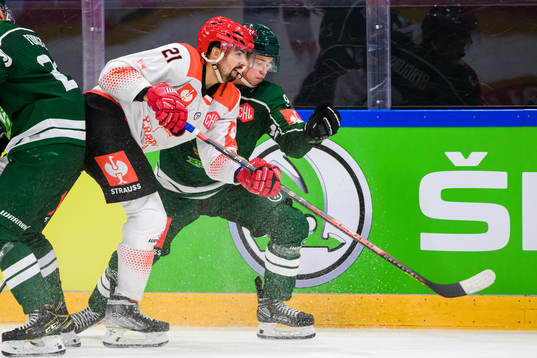 Marek Racuk of Cracovia and Anton Berglund of Färjestad