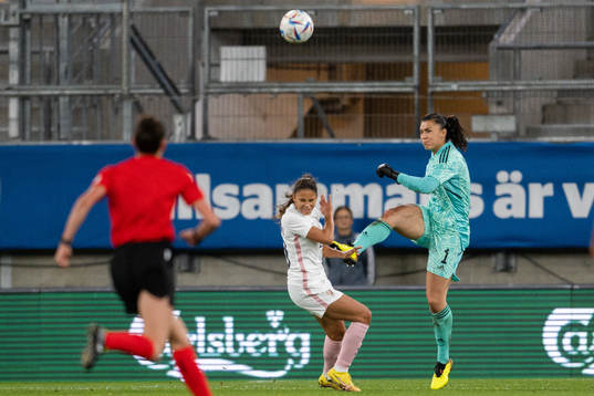 Delphine Cascarino of France and goalkeeper Zecira Musovic