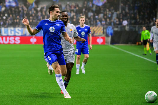 Benjamin Tiedemann Hansen of Molde and Emmanuel Banda of
