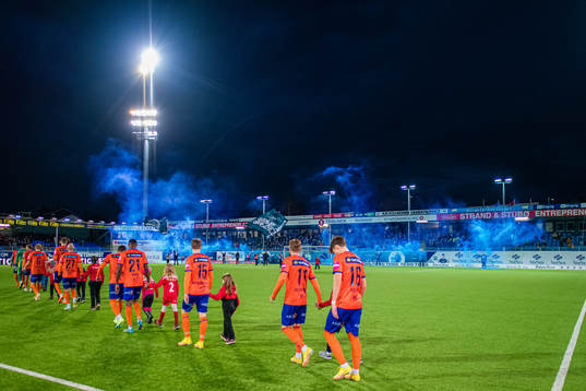 Spectators in the stands at Kristiansund Stadion ahead of the Eliteserien match between Kristiansund and Aalesund on October 30, 2022 in Kristiansund.