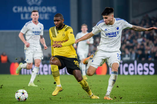 Anthony Modeste of Dortmund and Kevin Diks of FC Copenhagen