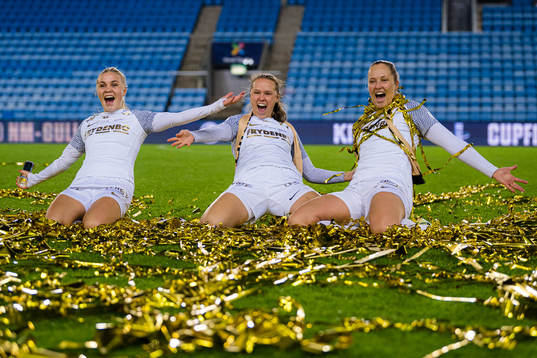 Hanne Larsen, Sandra Stavenes and Aurora Mikalsen of Brann celebrates with the trophy