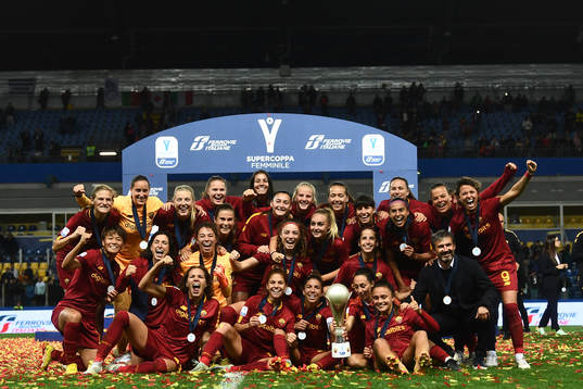 Players of Roma celebrate