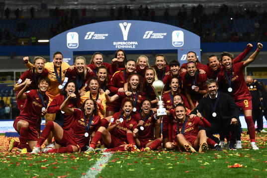 Players of Roma celebrate