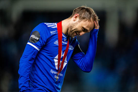 Magnus Wolff Eikrem of Molde celebrates winning the league
