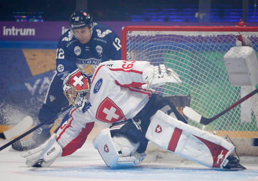 Leonardo Genoni of Switzerland and Marko Anttila of Finland