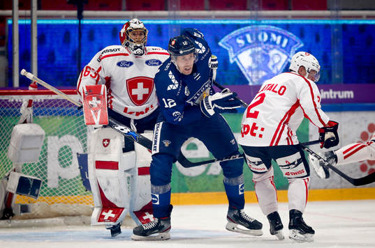 Marko Anttila of Finland, Leonardo Genoni and Santeri