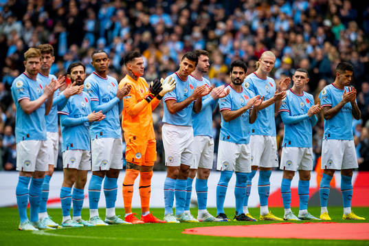 Goalkeeper Ederson, Rodri, Ilkay Gündogan, Erling Braut Haaland, Phil Foden and players of Manchester City ahead of the Premier League football match between Manchester City and Brentford on November 12, 2022 in Manchester. 