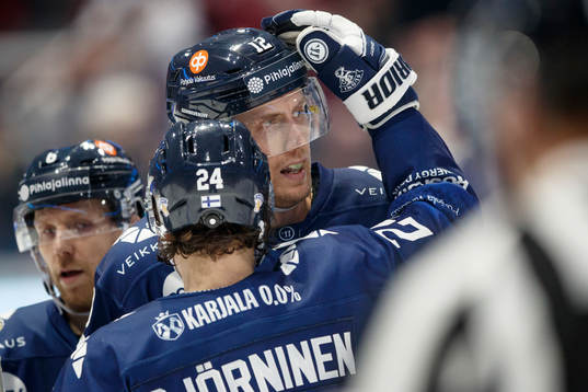 Marko Anttila of Finland celebrates with teammates