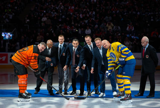 Daniel Sedin, Henrik Sedin and Daniel Alfredsson are joined