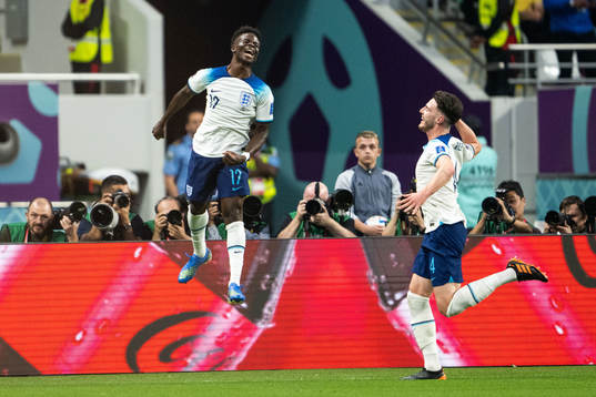 Bukayo Saka and Declan Rice of England celebrate 2-0