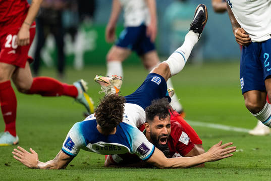 John Stones of England and Hossein Kanani of Iran
