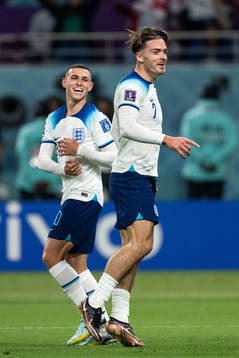 Phil Foden and Jack Grealish of England celebrate 6-1