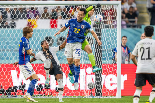 Kou Itakura, Maya Yoshida and goalkeeper Shuichi Gondaof Japan defend against Serge Gnabry of Germany