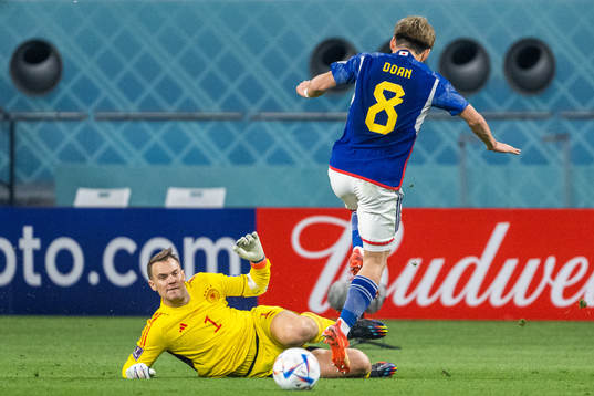 goalkeeper Manuel Neuer of Germany and Ritsu Doan of Japan