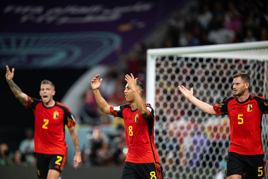 Toby Alderweireld, Youri Tielemans and Jan Vertonghen of Belgium react