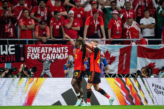 Michy Batshuayi of Belgium celebrates with Timothy Castagne after 1-0