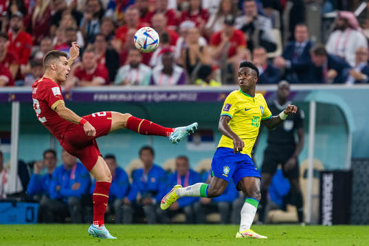 Darko Lazovic of Serbia and Vinicius Junior of Brazil