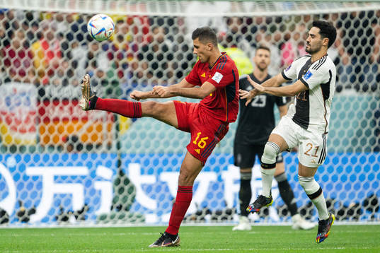 Rodri of Spain and Ilkay Gündogan of Germany