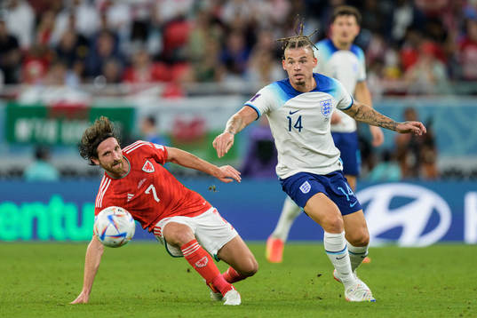 Joe Allen of Wales and Kalvin Phillips of England