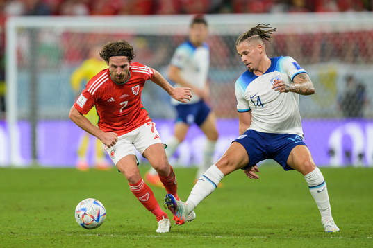 Joe Allen of Wales and Kalvin Phillips of England