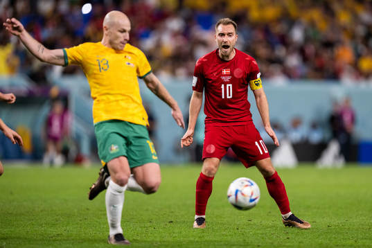 Aaron Mooy of Australia and Christian Eriksen of Denmark