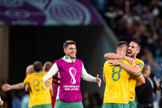 Fran Karacic, Bailey Wright and Milos Degenek of Australia celebrate