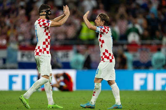 Josko Gvardiol and Luka Modric of Croatia celebrate