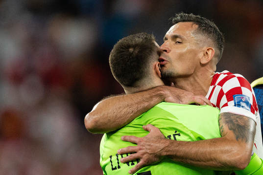 goalkeeper Dominik Livakovic and Dejan Lovren of Croatia celebrate