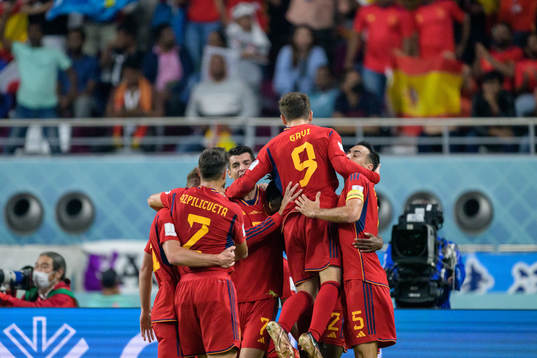 Alvaro Morata of Spain celebrate with teammates after scoring 0-1